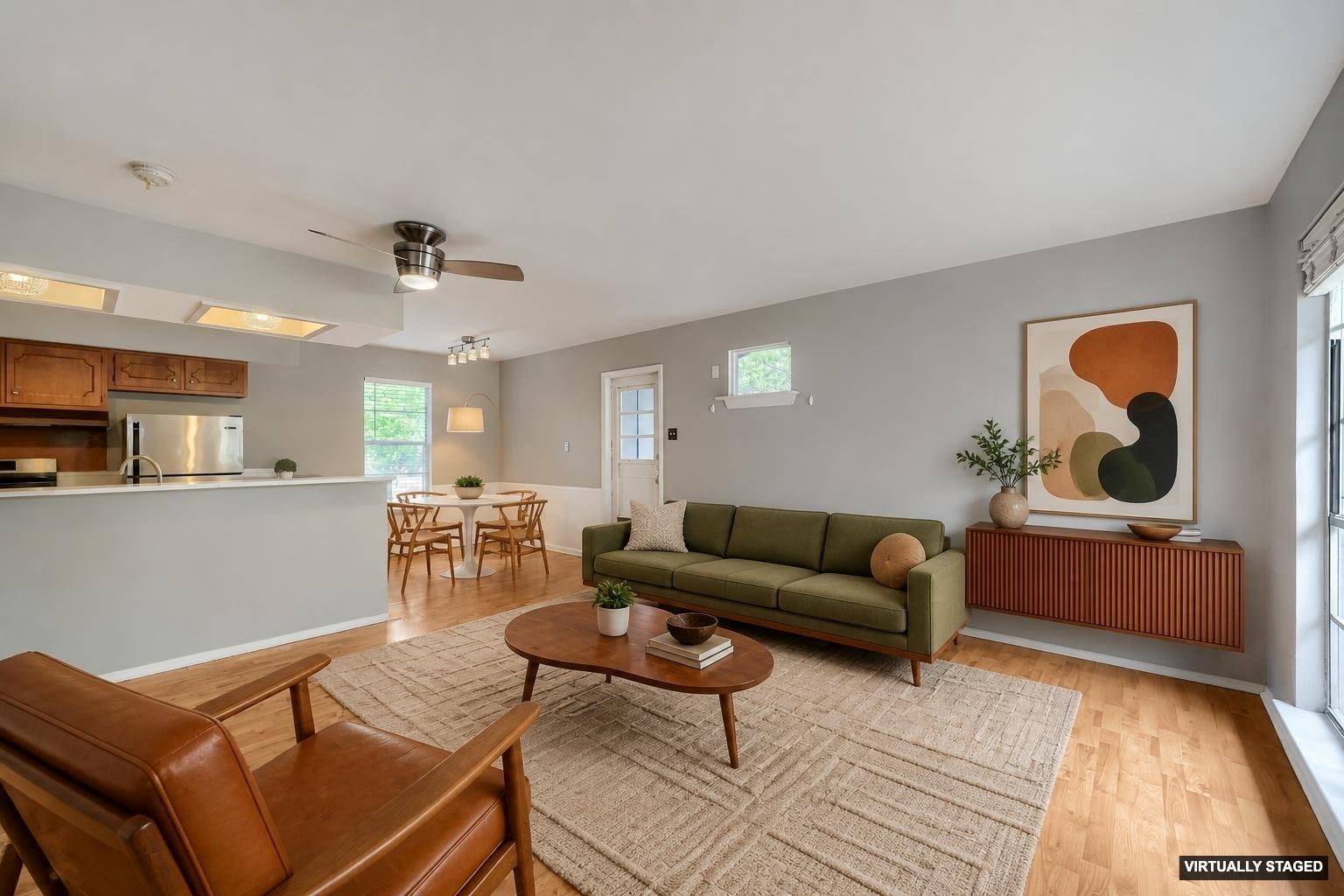 Hardwood flooring extends throughout this well-ap