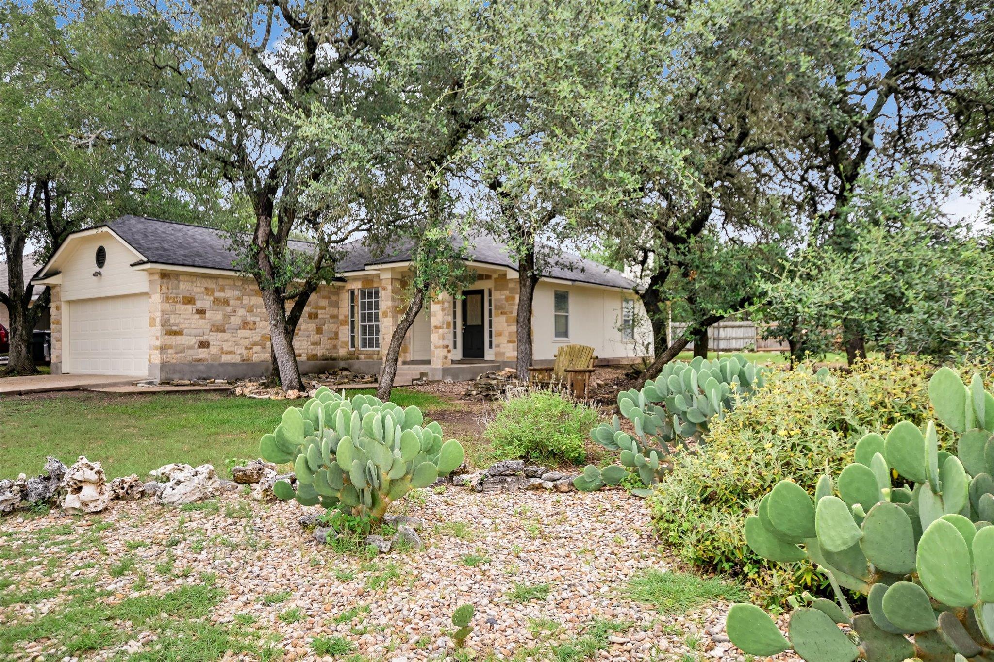 Mature trees and desert landscaping frame this ch