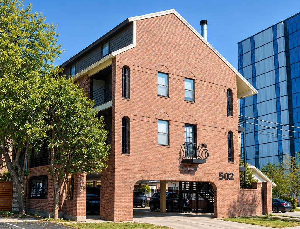 Striking brick exterior features classic arched d