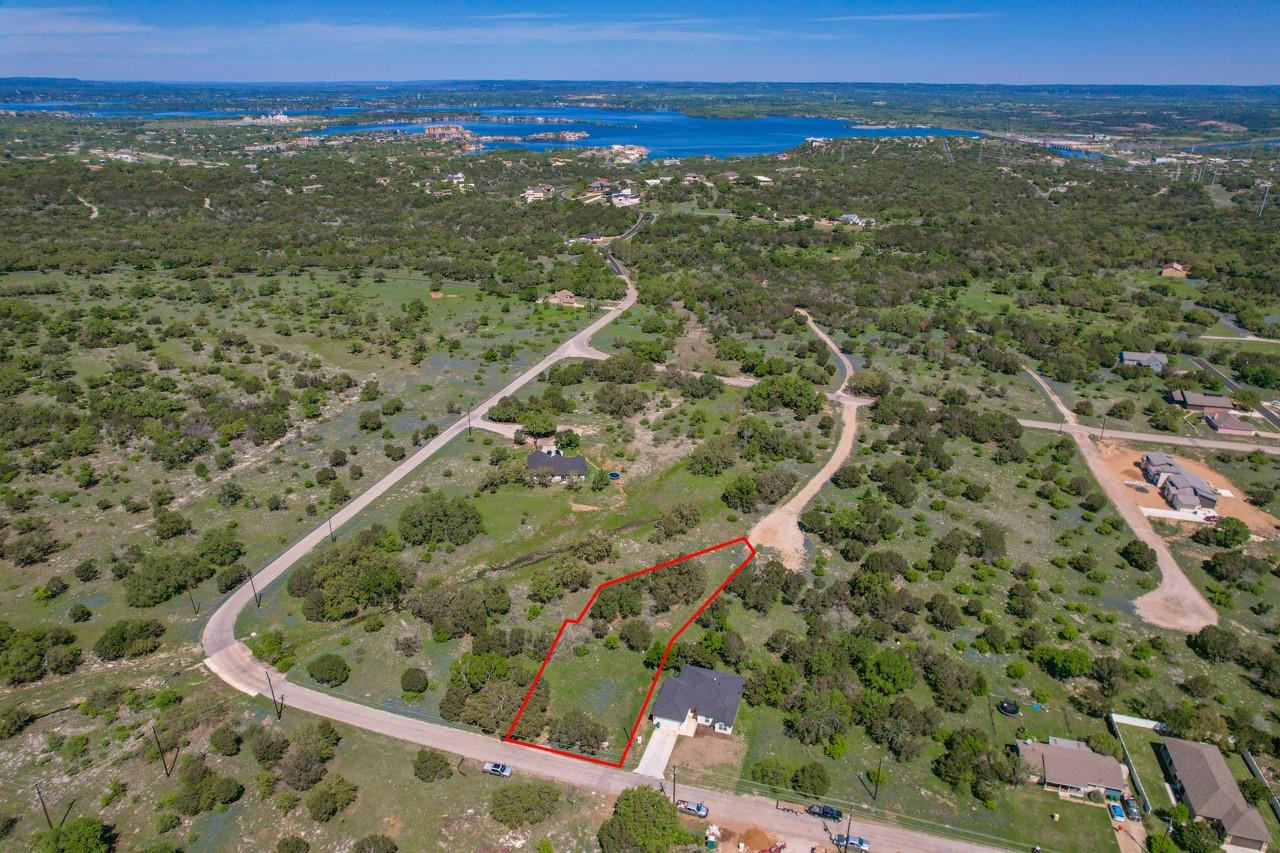 A sweeping aerial perspective reveals a vast, ver