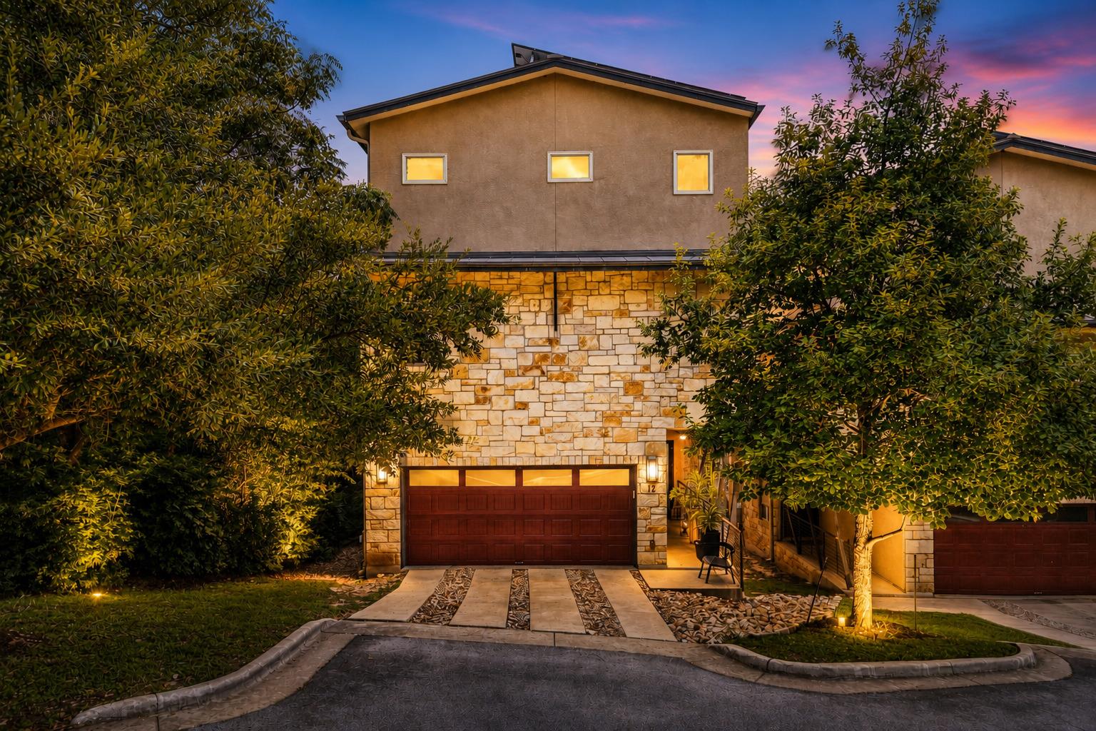 Stone and stucco create an impressive facade for 