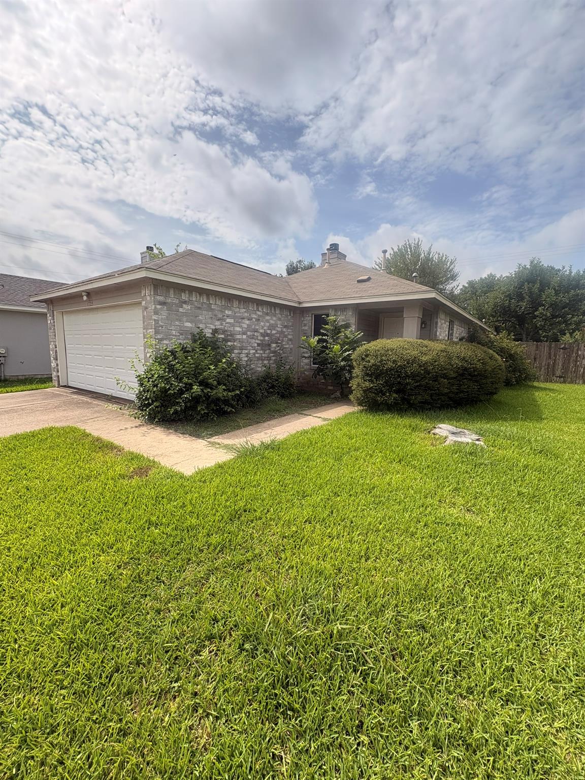 A classic brick exterior offers enduring curb app