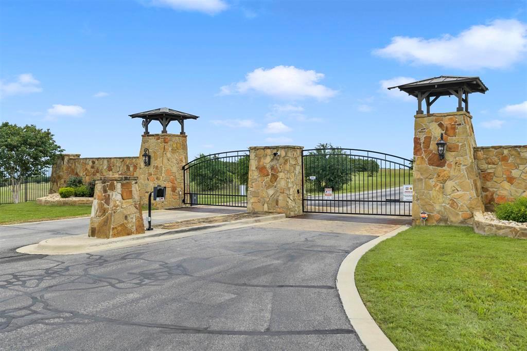 Secure community entrance with impressive stone p