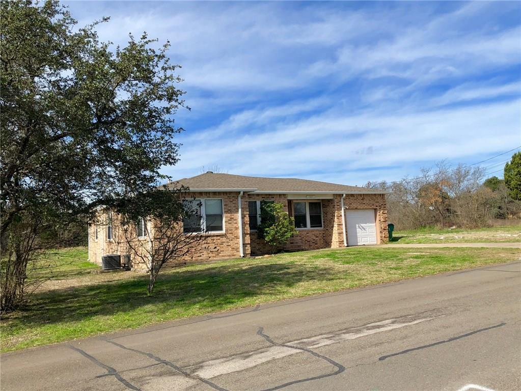 A well-maintained brick ranch home with an attach