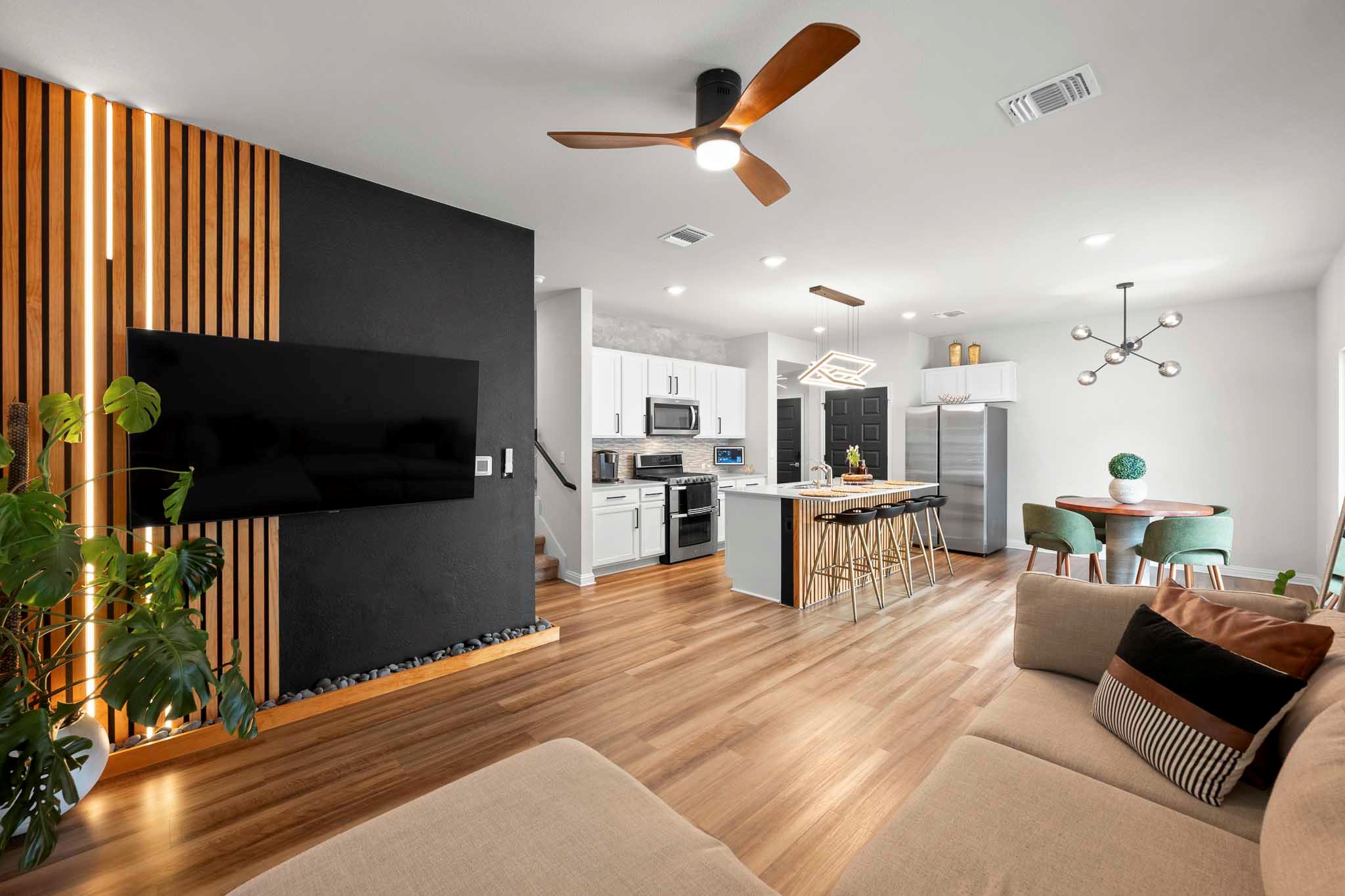 An open-concept living space integrates a stylish