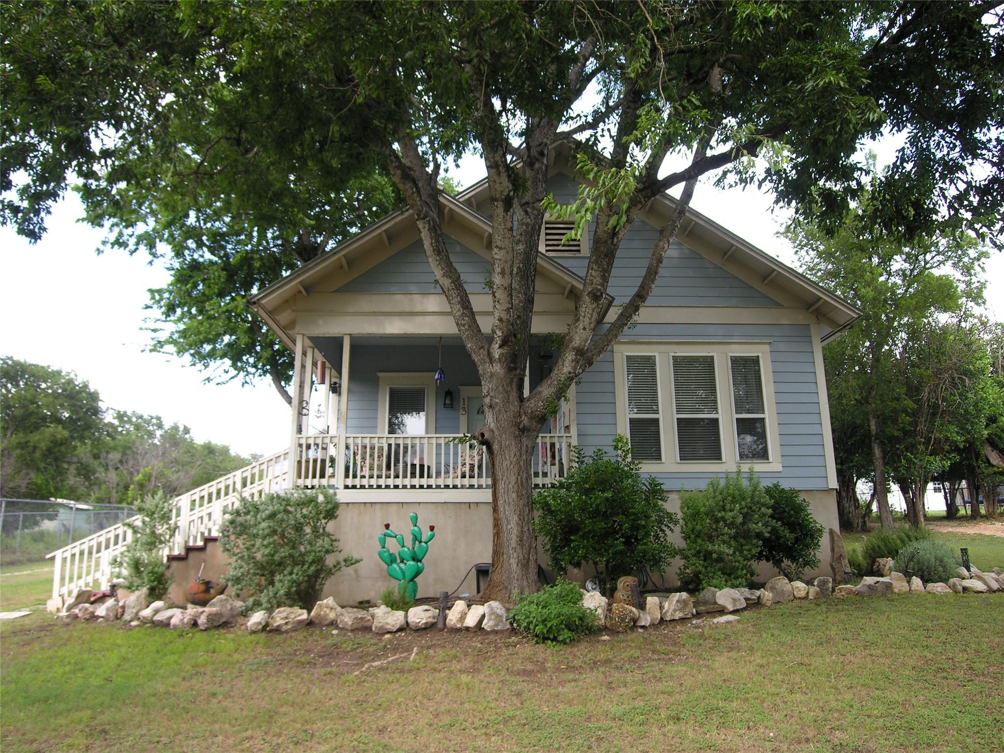 A charming cottage facade, complete with a welcom