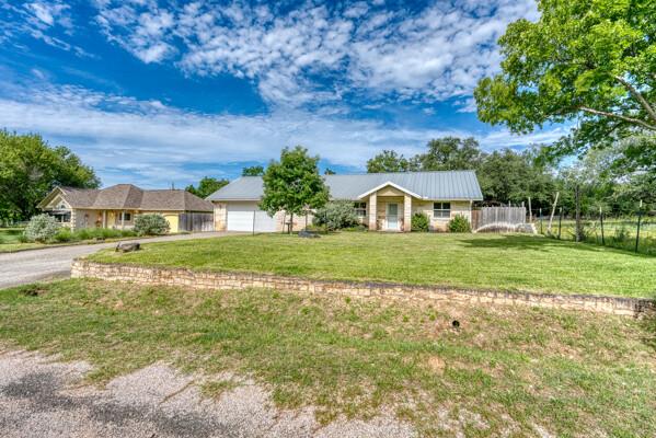 A classic ranch home nestled amidst lush greenery
