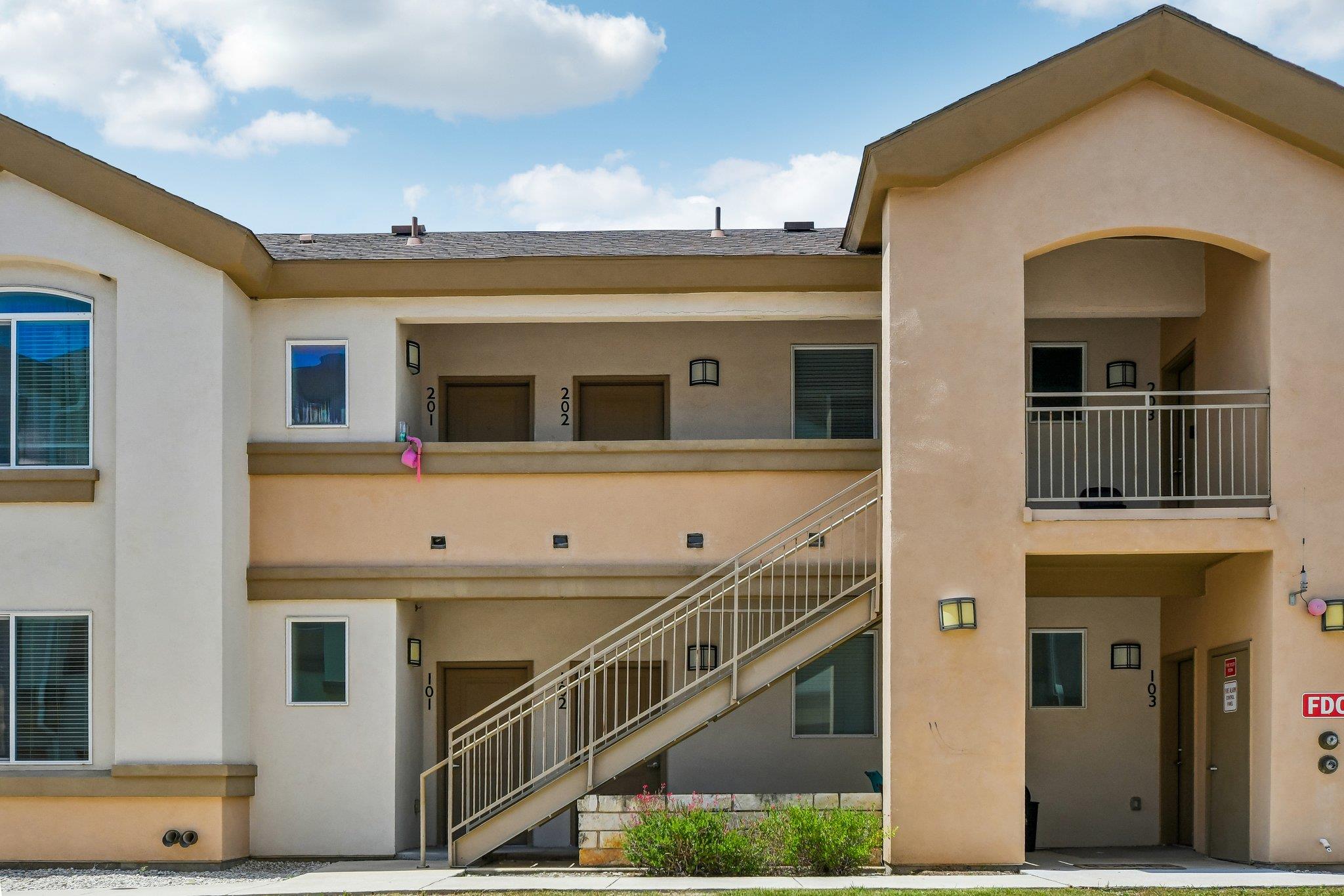 Multi-level living spaces offer private balconies
