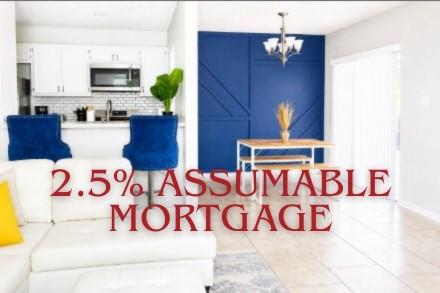 An open floorplan seamlessly connects the bright 