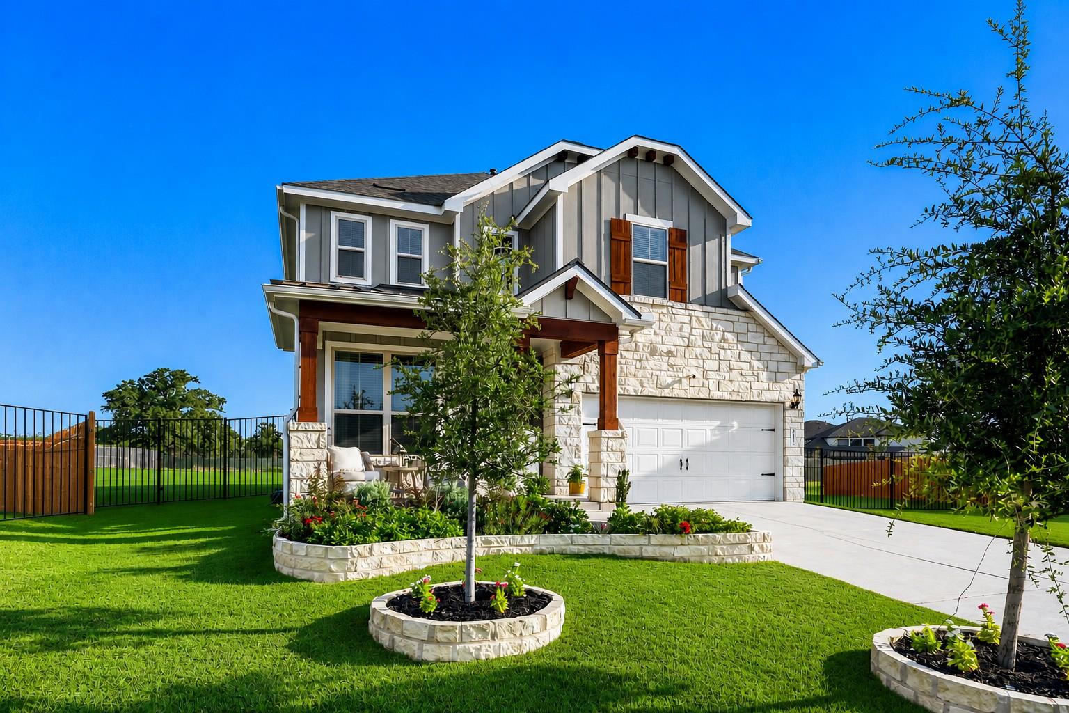 Crafted with board and batten siding and stone ac