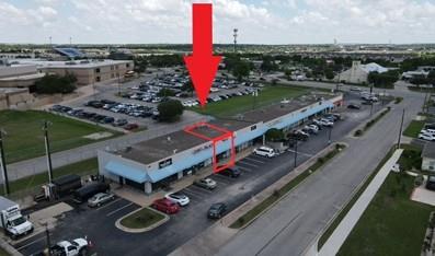 Prime commercial property with ample parking, per