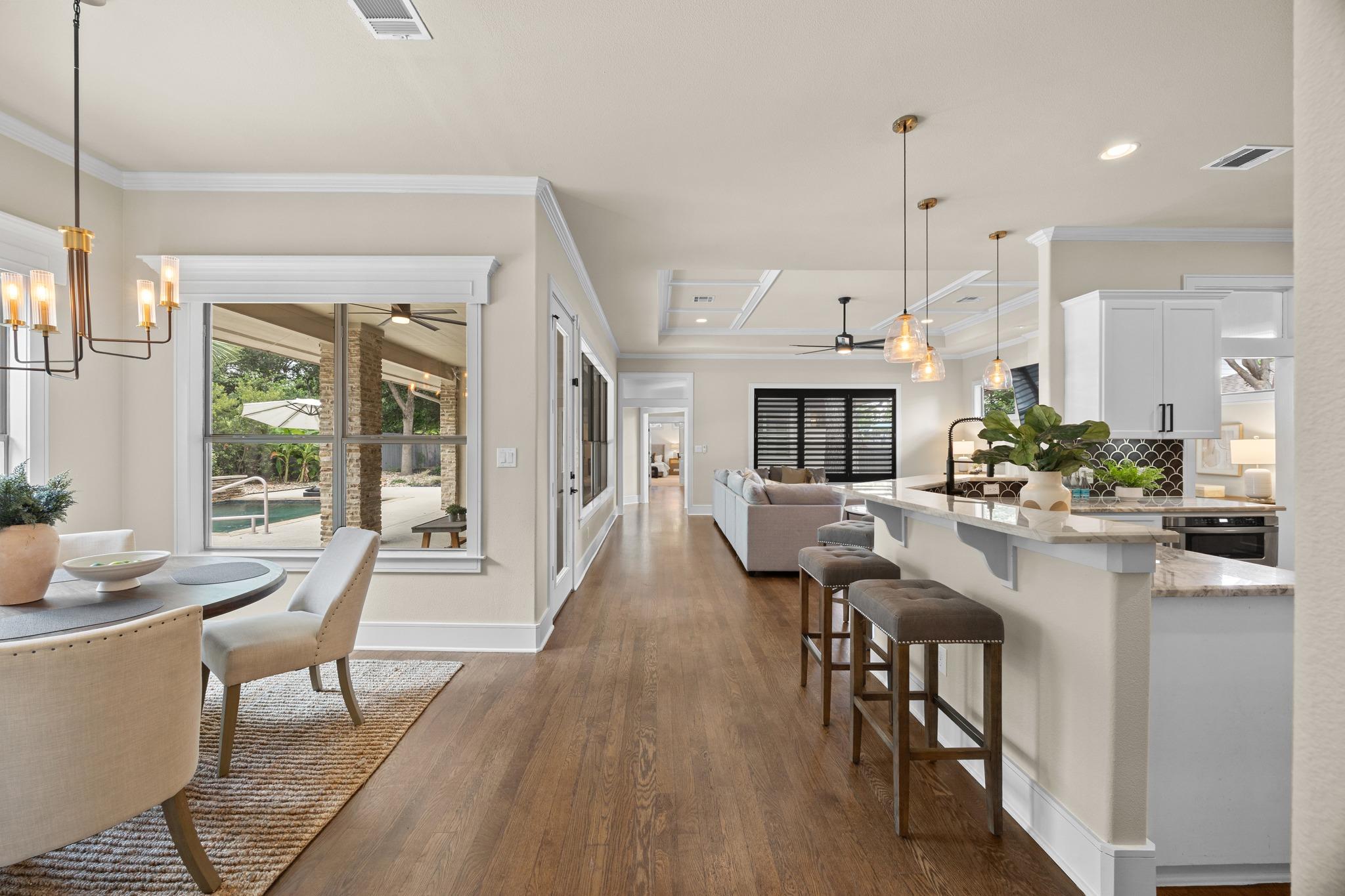 Gleaming hardwood floors and classic crown moldin