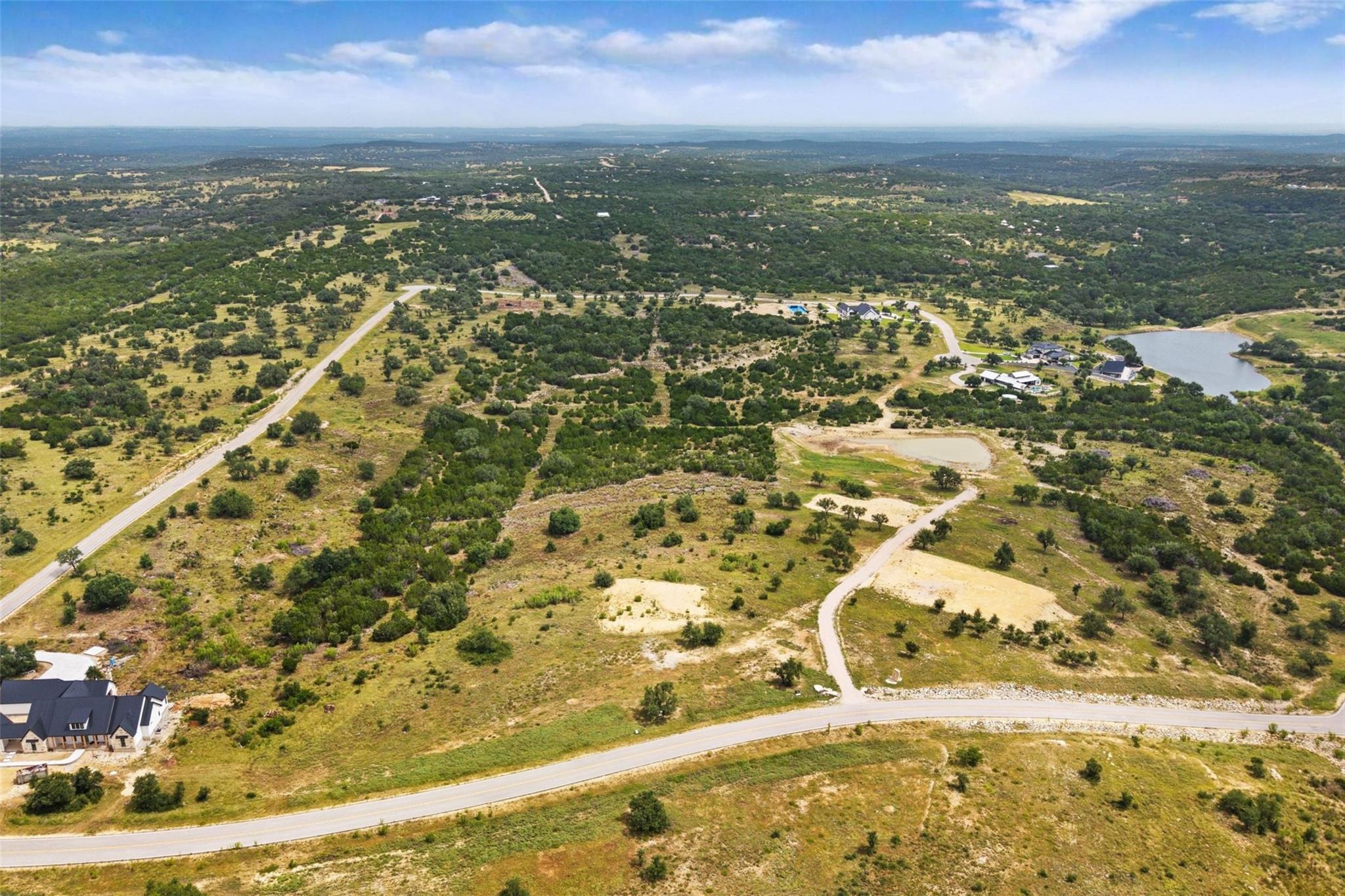 Rolling hills and ample acreage define this spraw