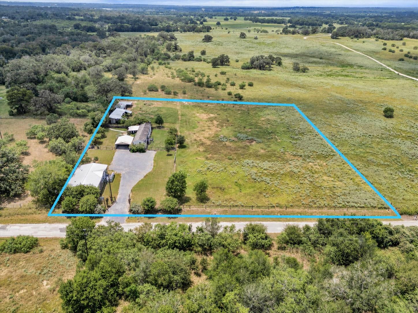 An aerial perspective reveals a vast land parcel 