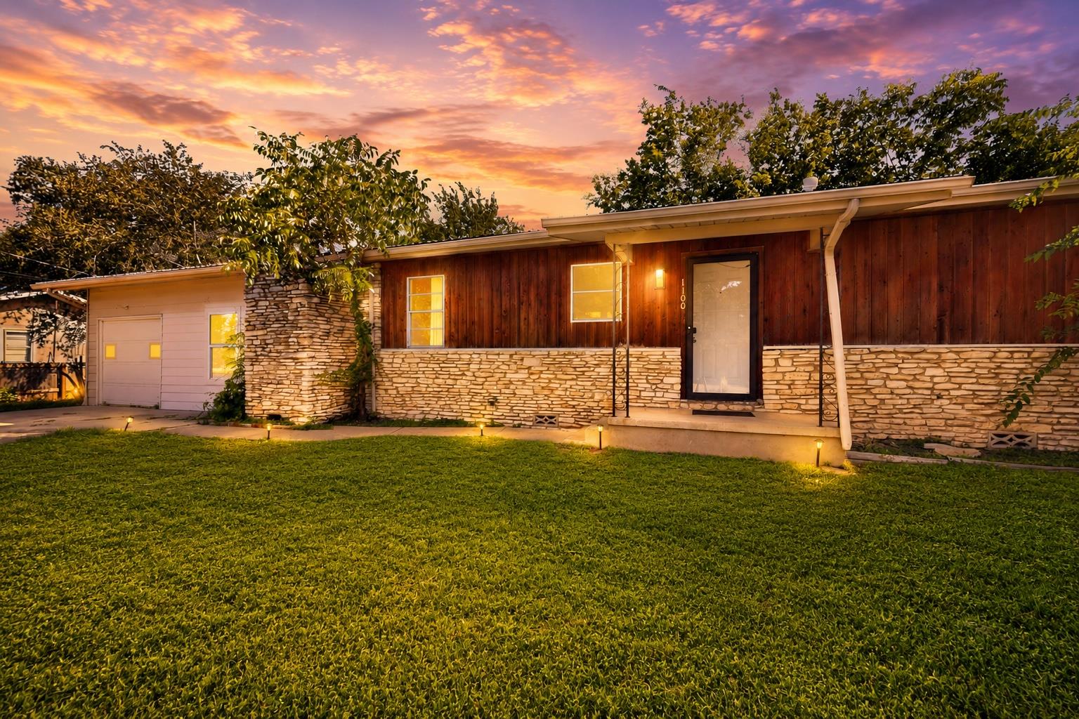 A charming exterior showcases a blend of rich woo