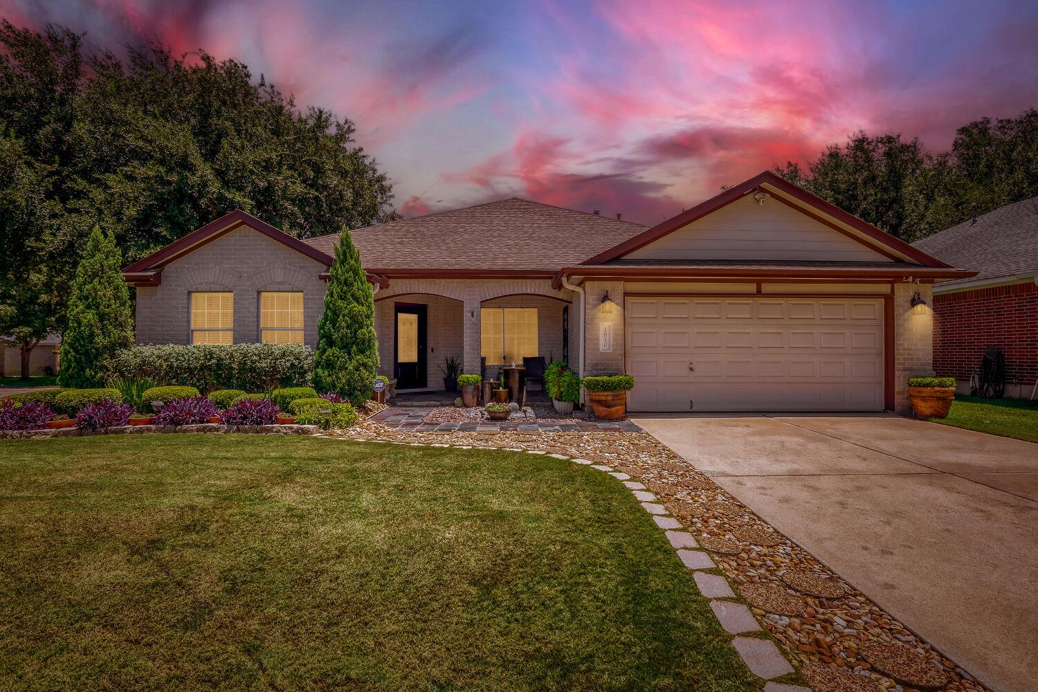 A welcoming front exterior with well-maintained l