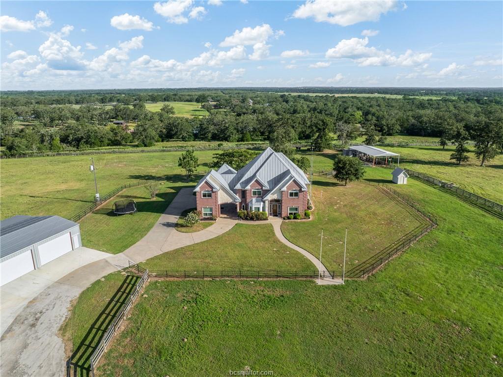 An aerial perspective reveals a majestic estate n