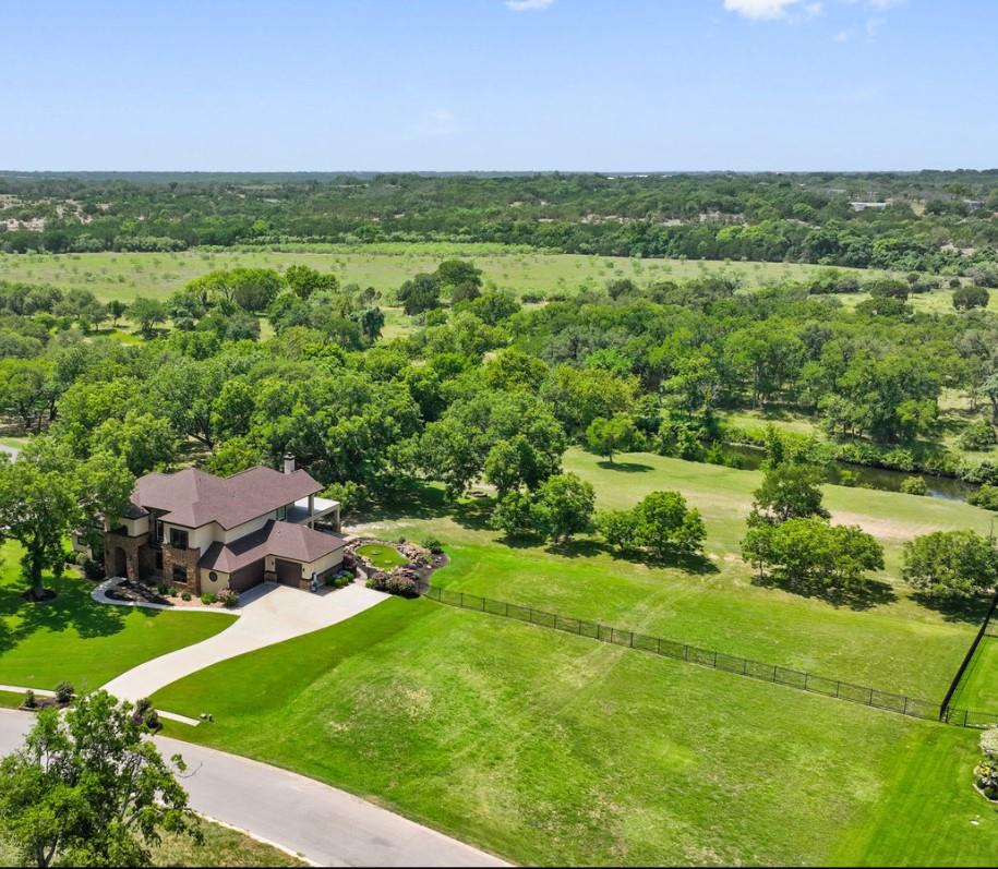 An aerial perspective showcases a custom estate n