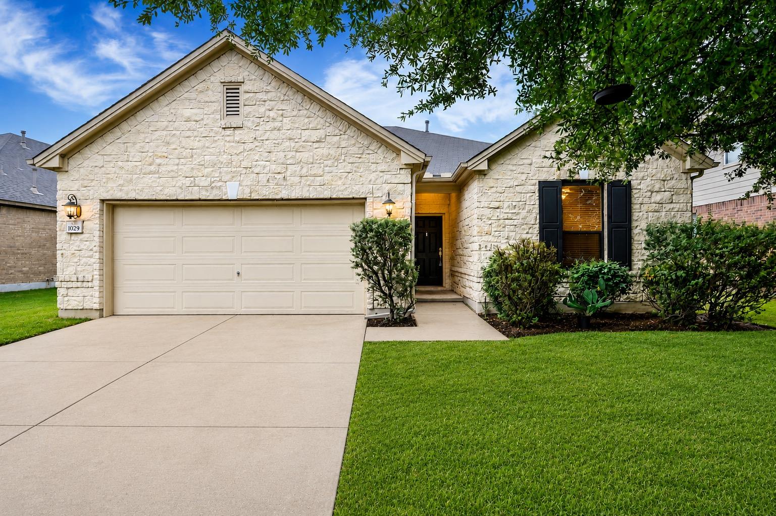 Textured light stone masonry pairs with classic s