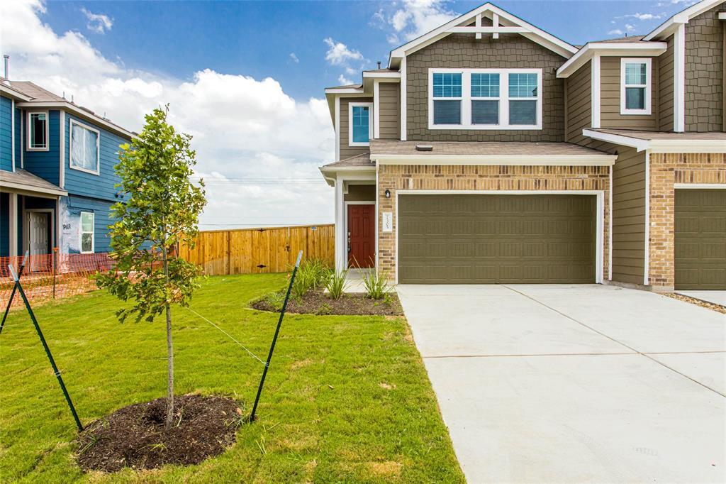A newly constructed residence features a well-mai