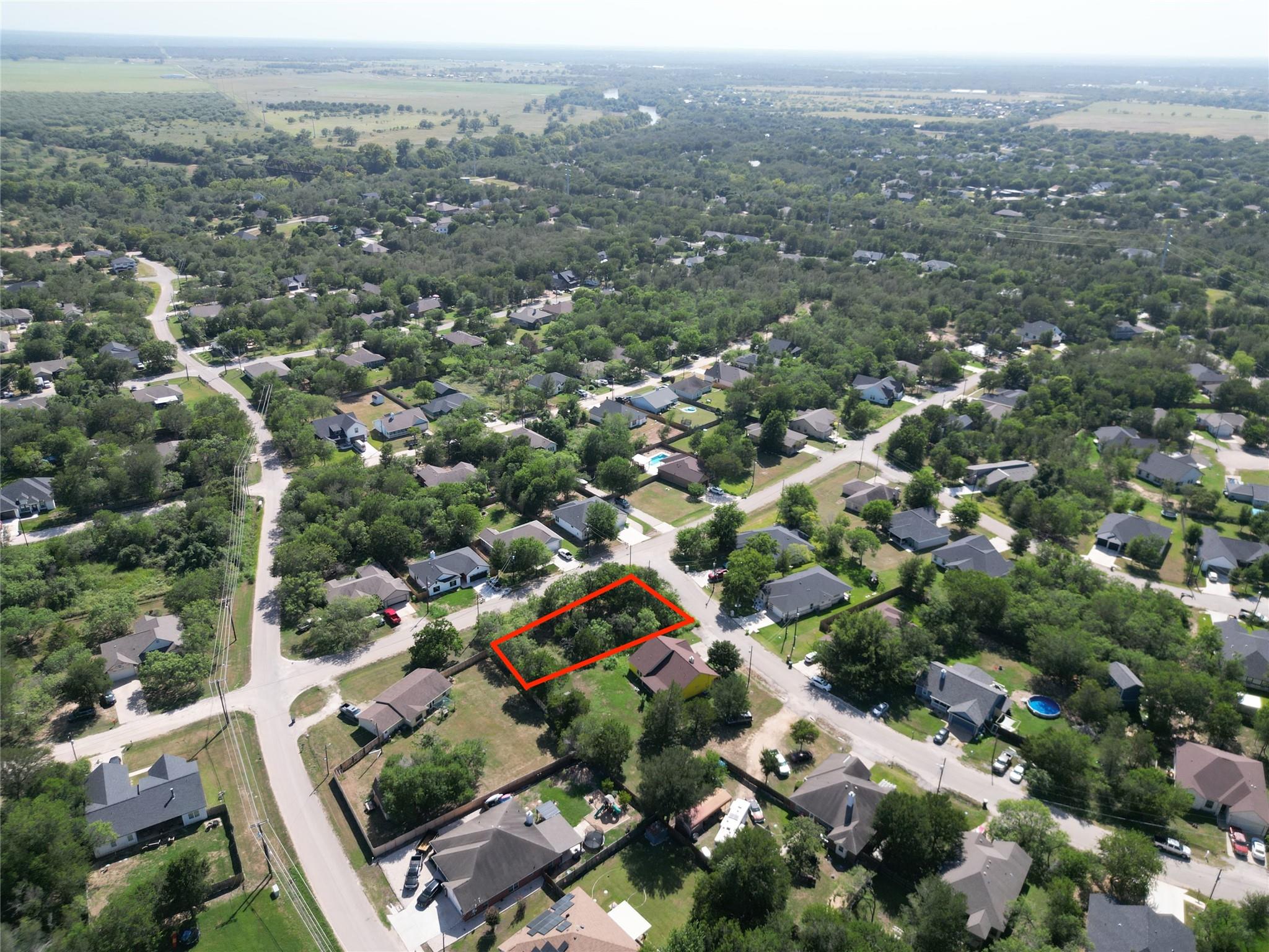 An aerial perspective reveals a verdant neighborh