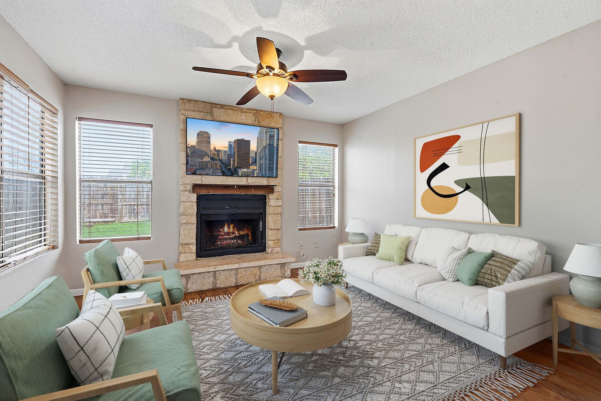 A welcoming living room features a stone fireplac