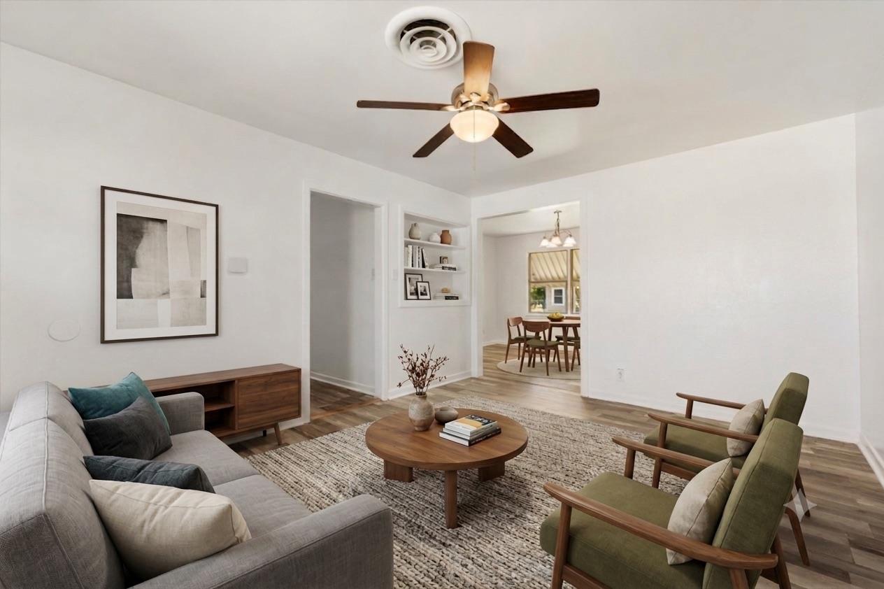 A welcoming living room featuring warm wood floor