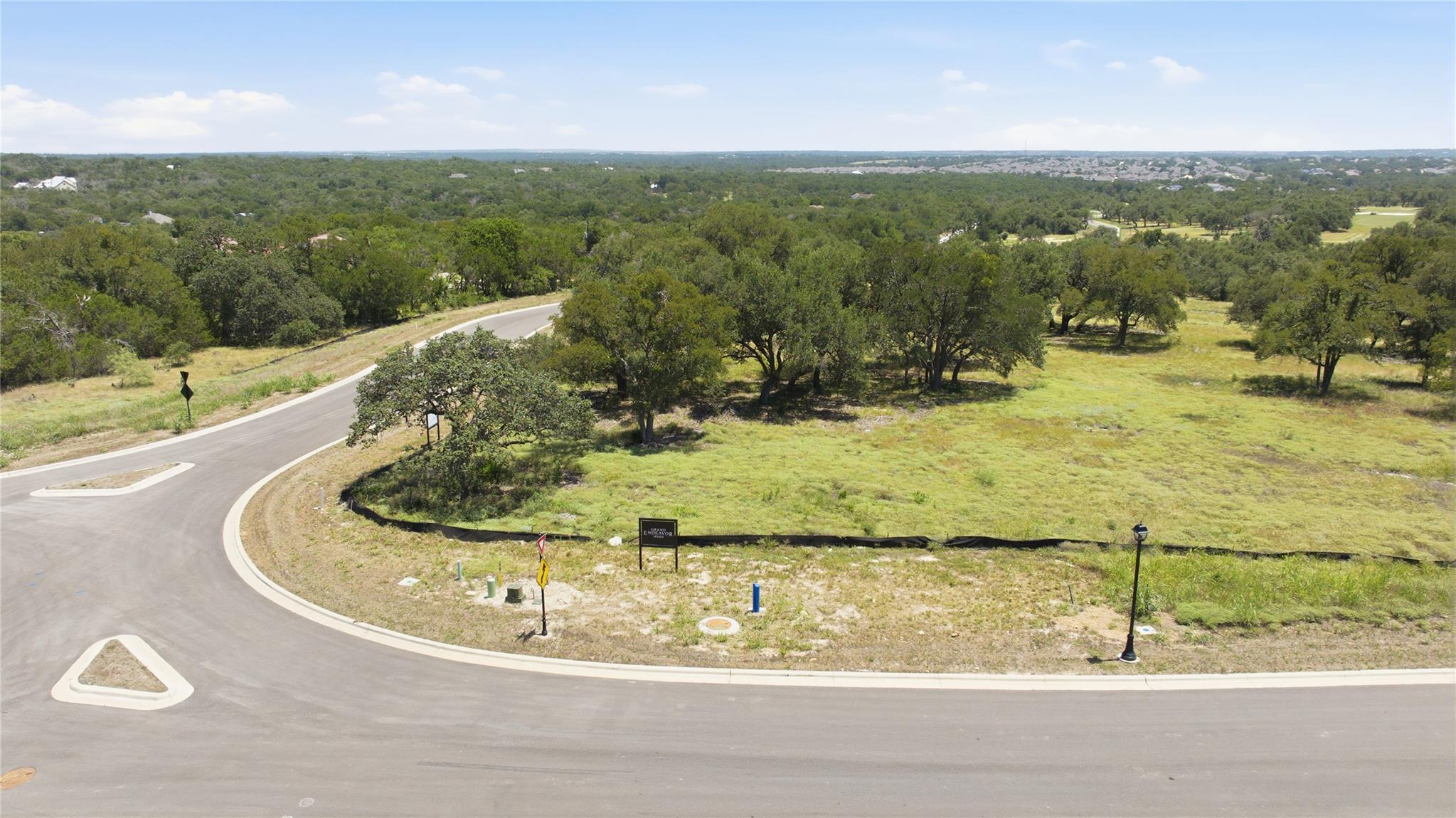 A verdant, buildable lot offers scenic views and 