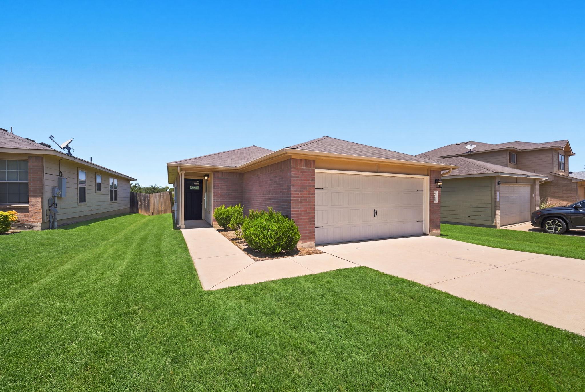 A neatly manicured lawn enhances the curb appeal 