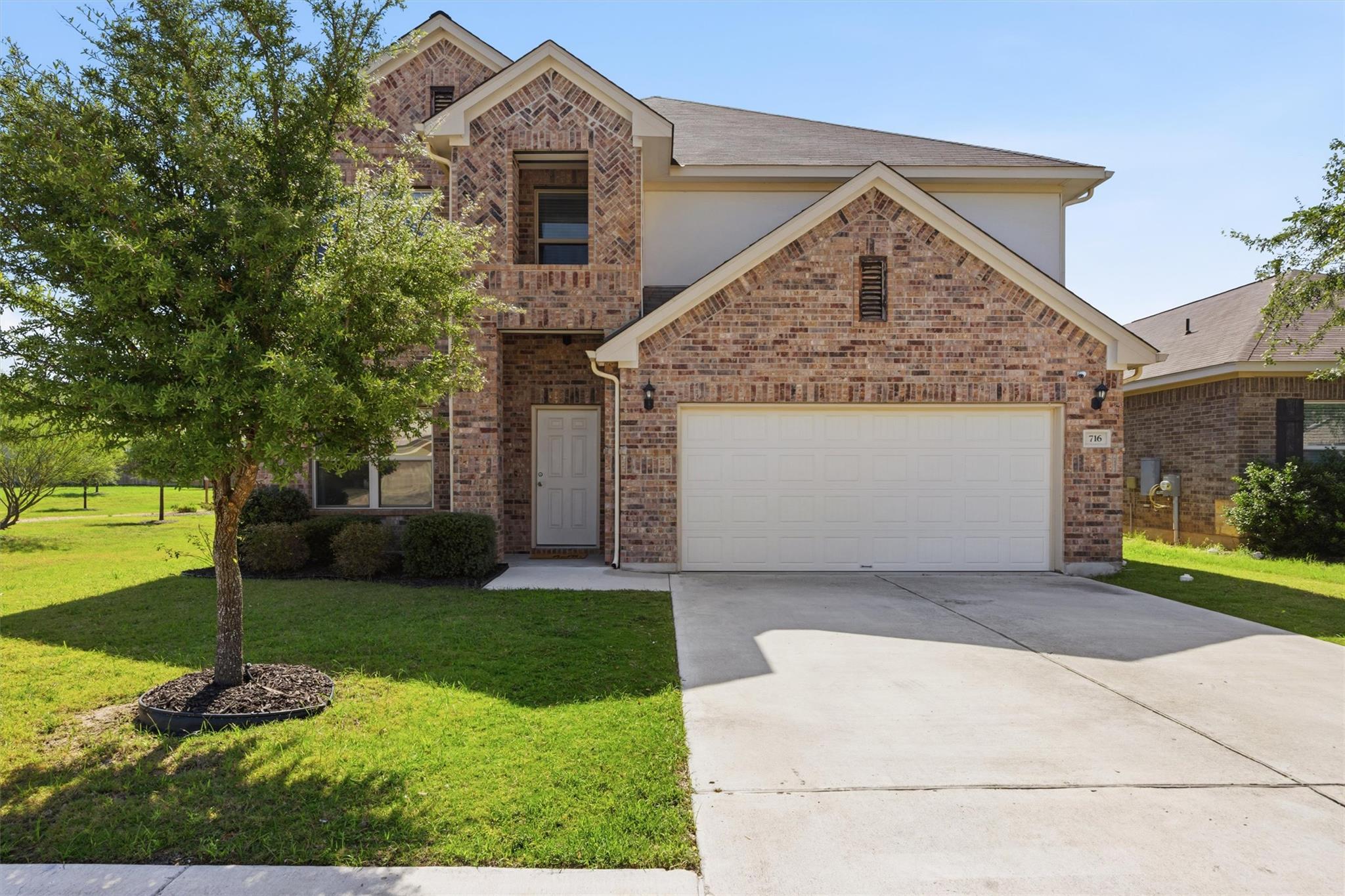 A classic brick exterior with a welcoming entrywa