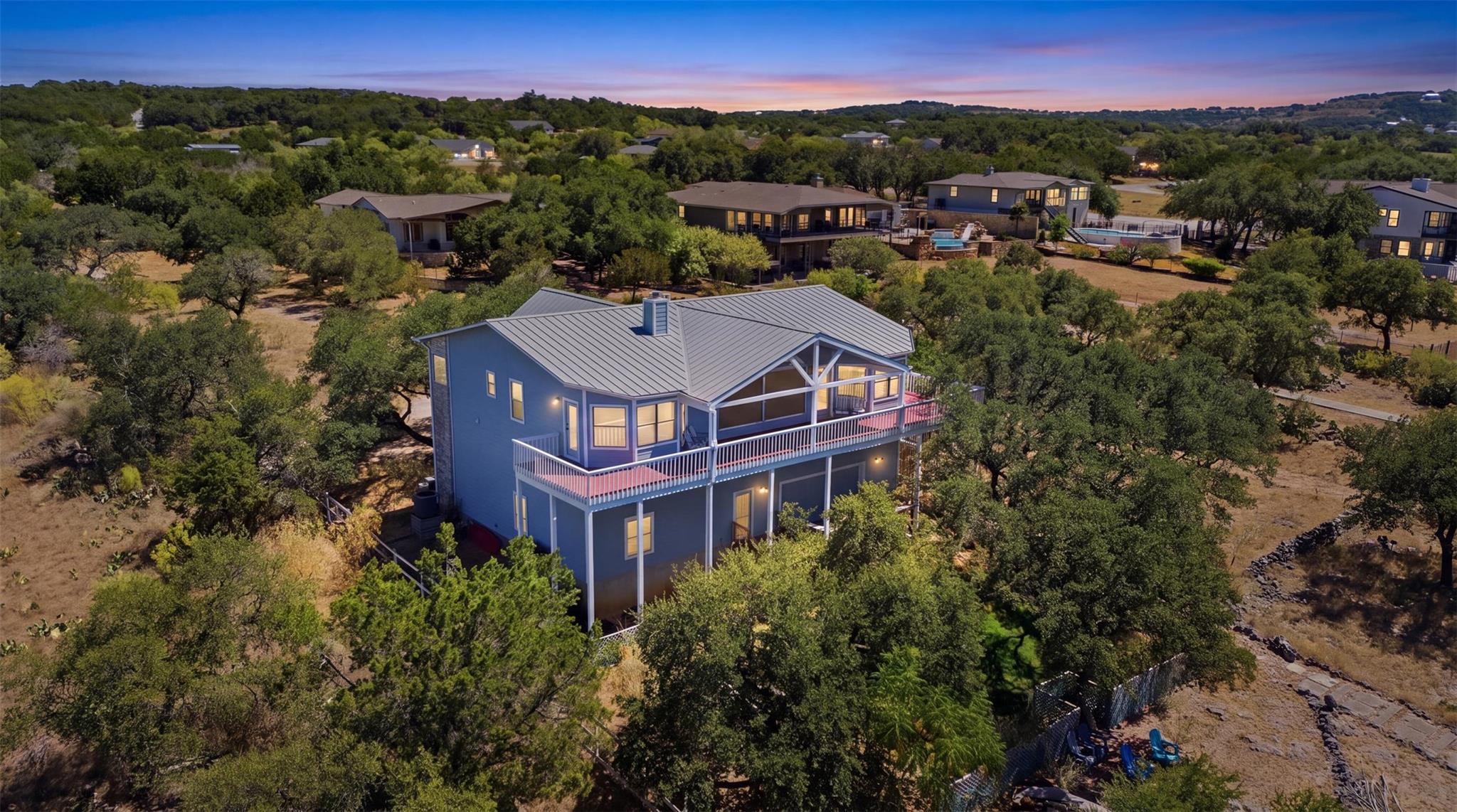 An elevated perspective showcases the metal roof 
