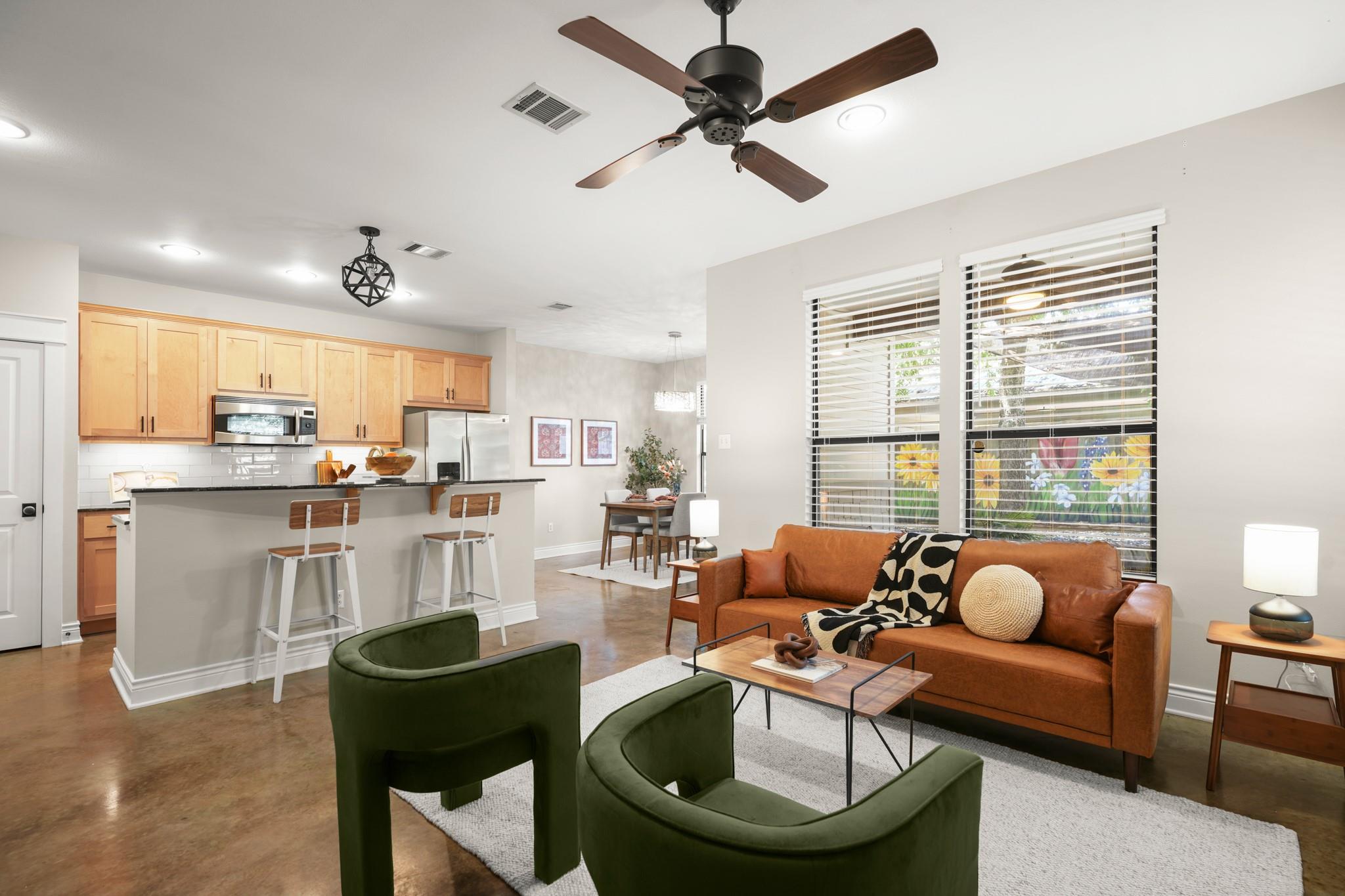 An open floorplan seamlessly connects the well-ap