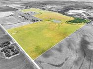An aerial perspective reveals vast acreage, featu