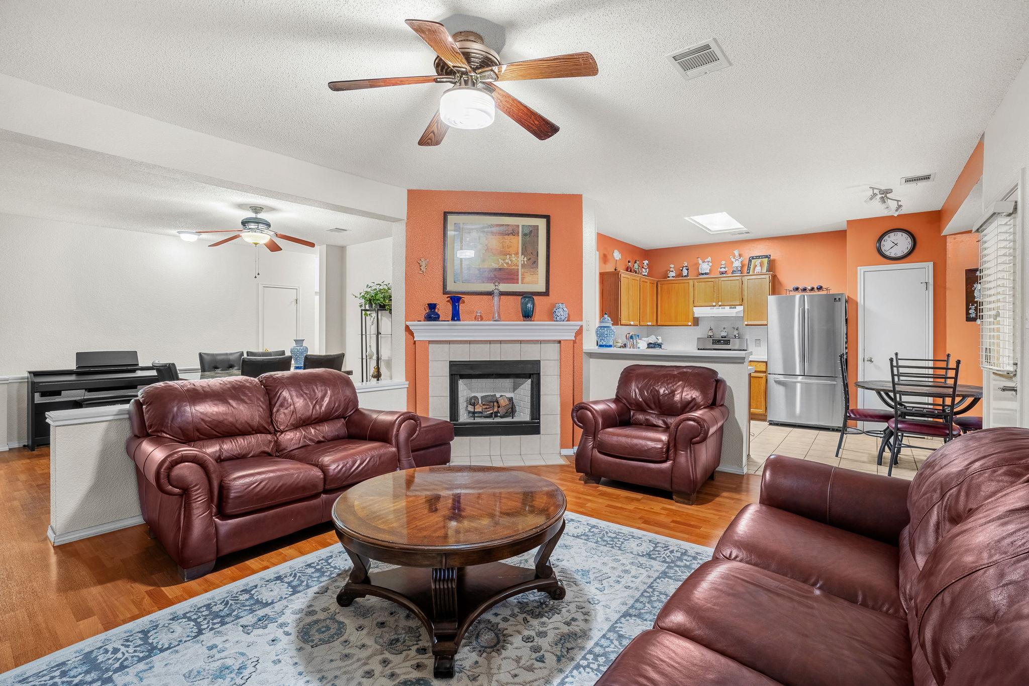 An inviting common area offers hardwood flooring,