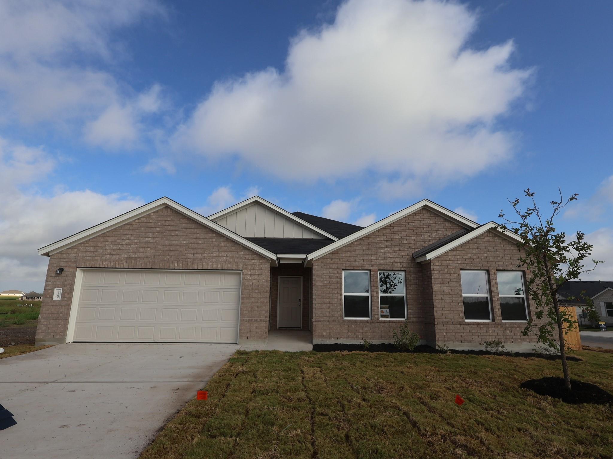 Brick exteriors and gabled rooflines create class
