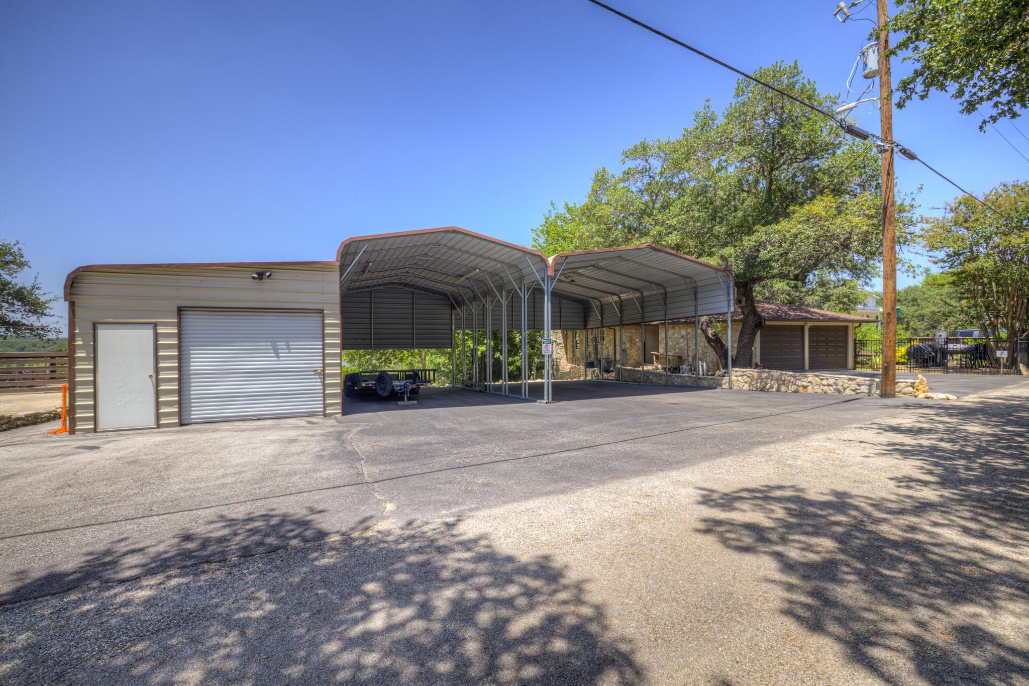 A spacious outdoor area features an expansive car