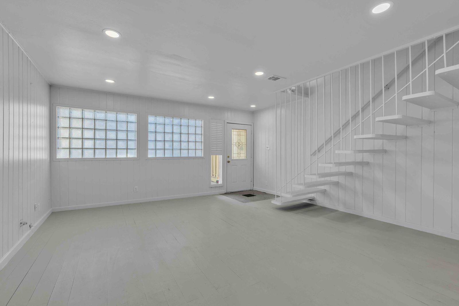 Minimalist living space offers modern glass block