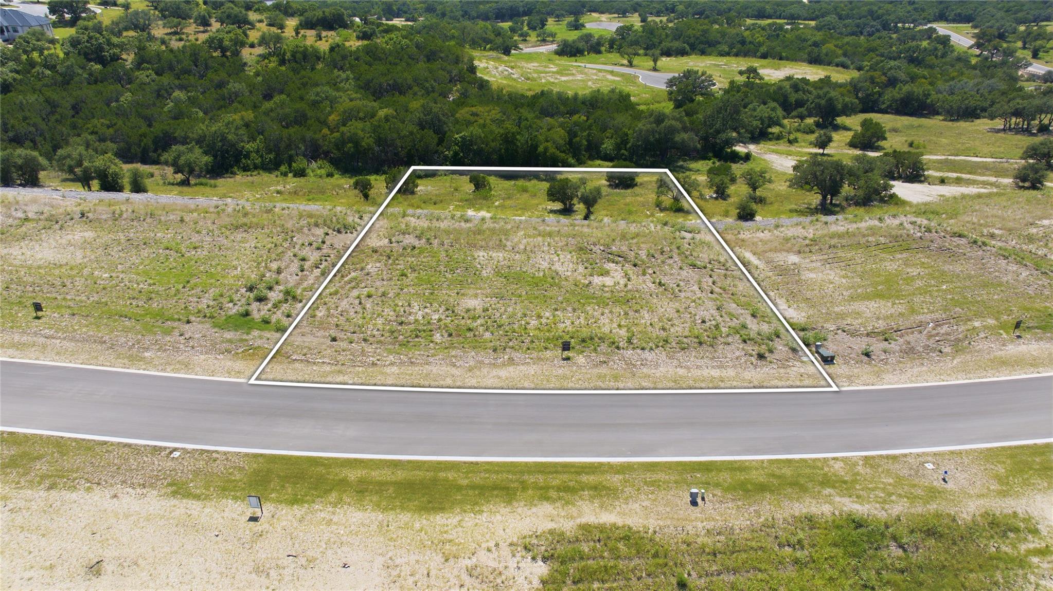 A promising buildable lot, featuring ample green 