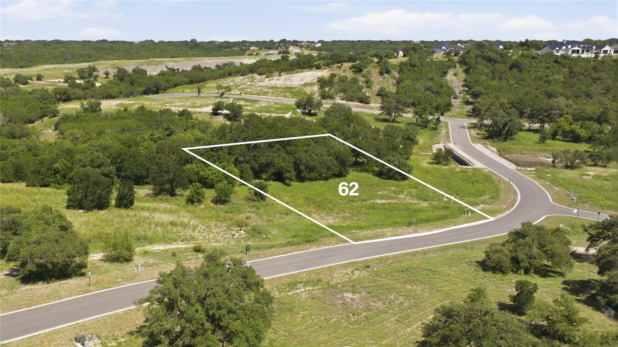 A spacious, buildable lot nestled in a verdant la