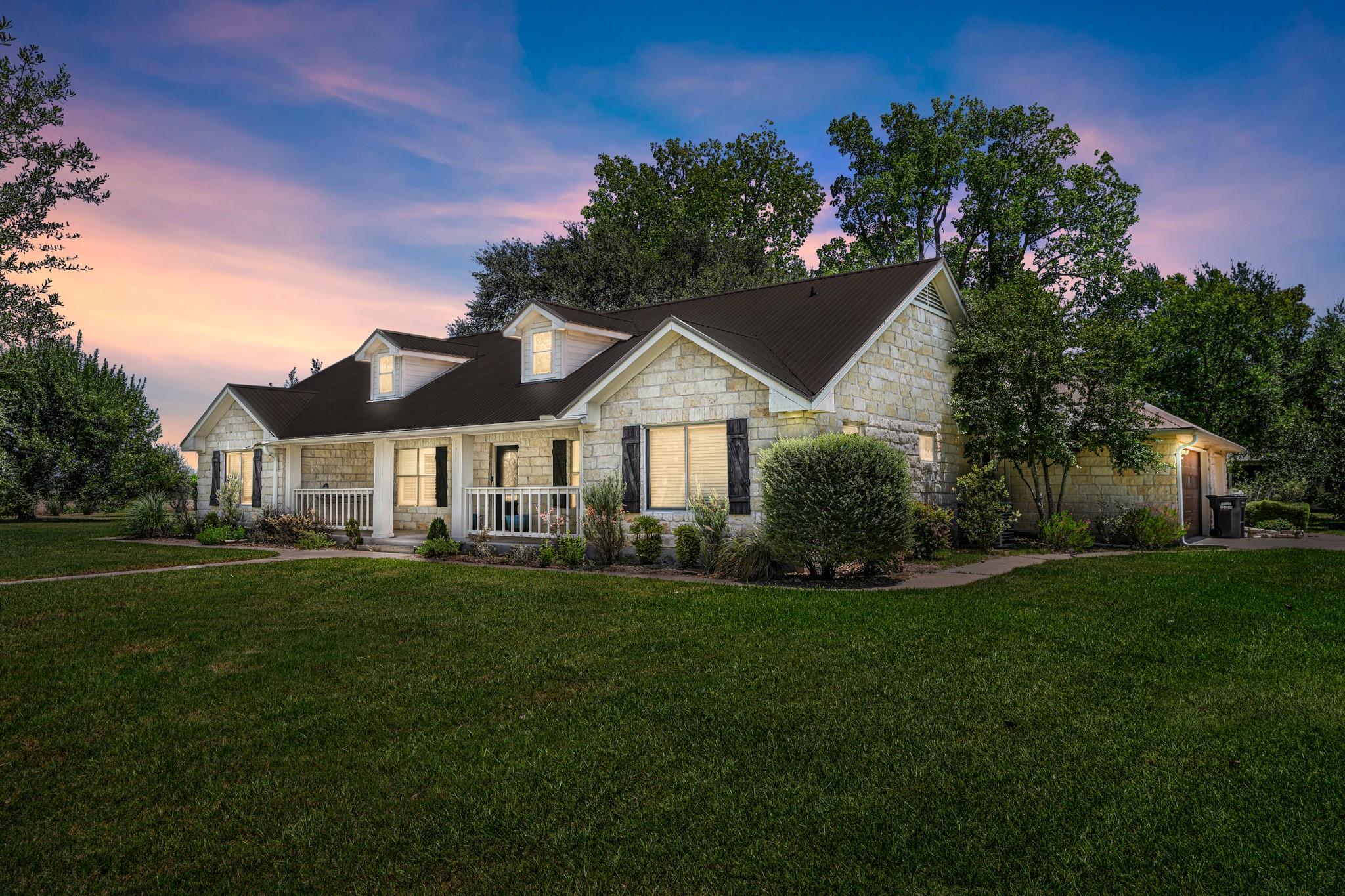 A graceful stone residence with a welcoming front