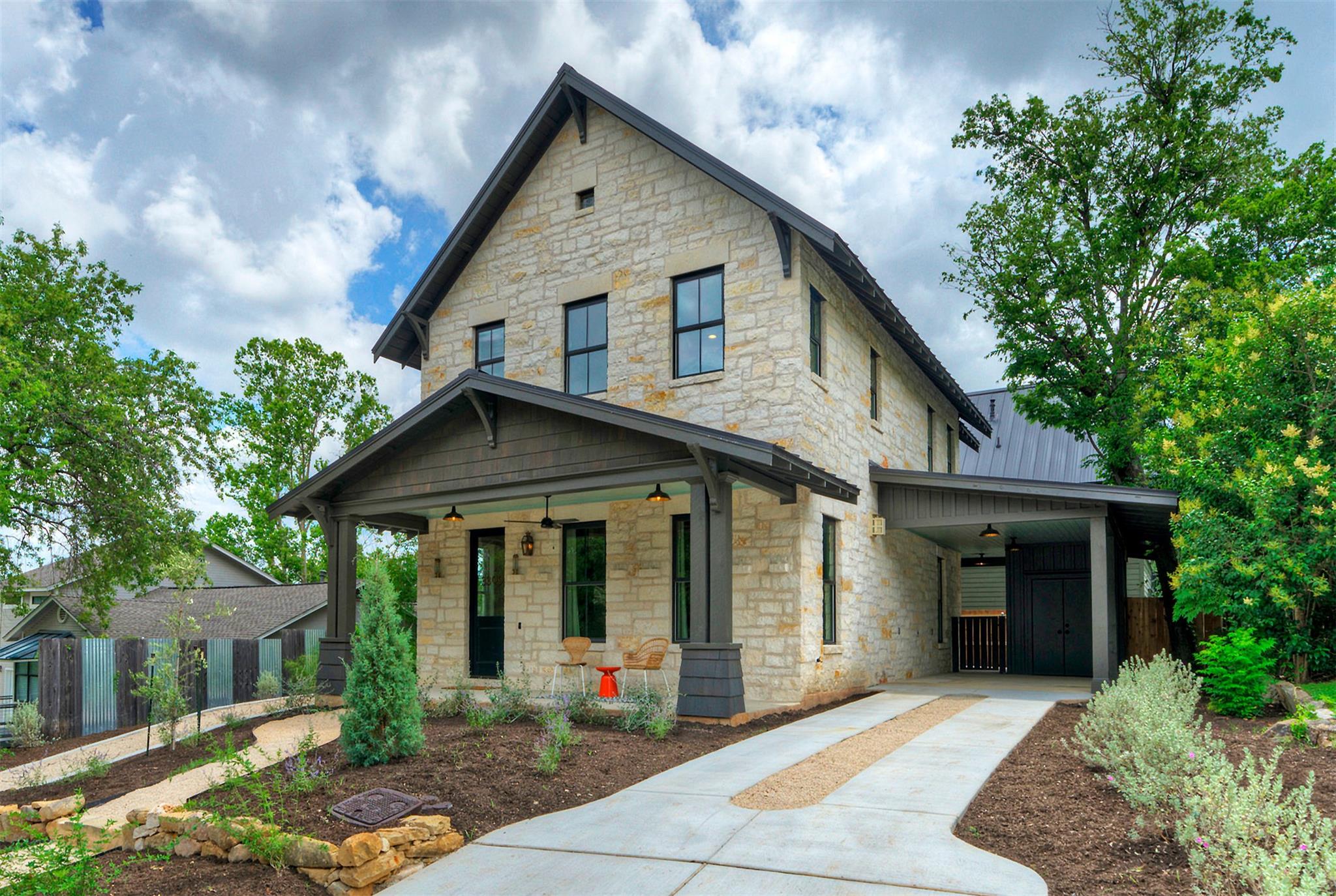 Crafted stone and warm wood accents define this w