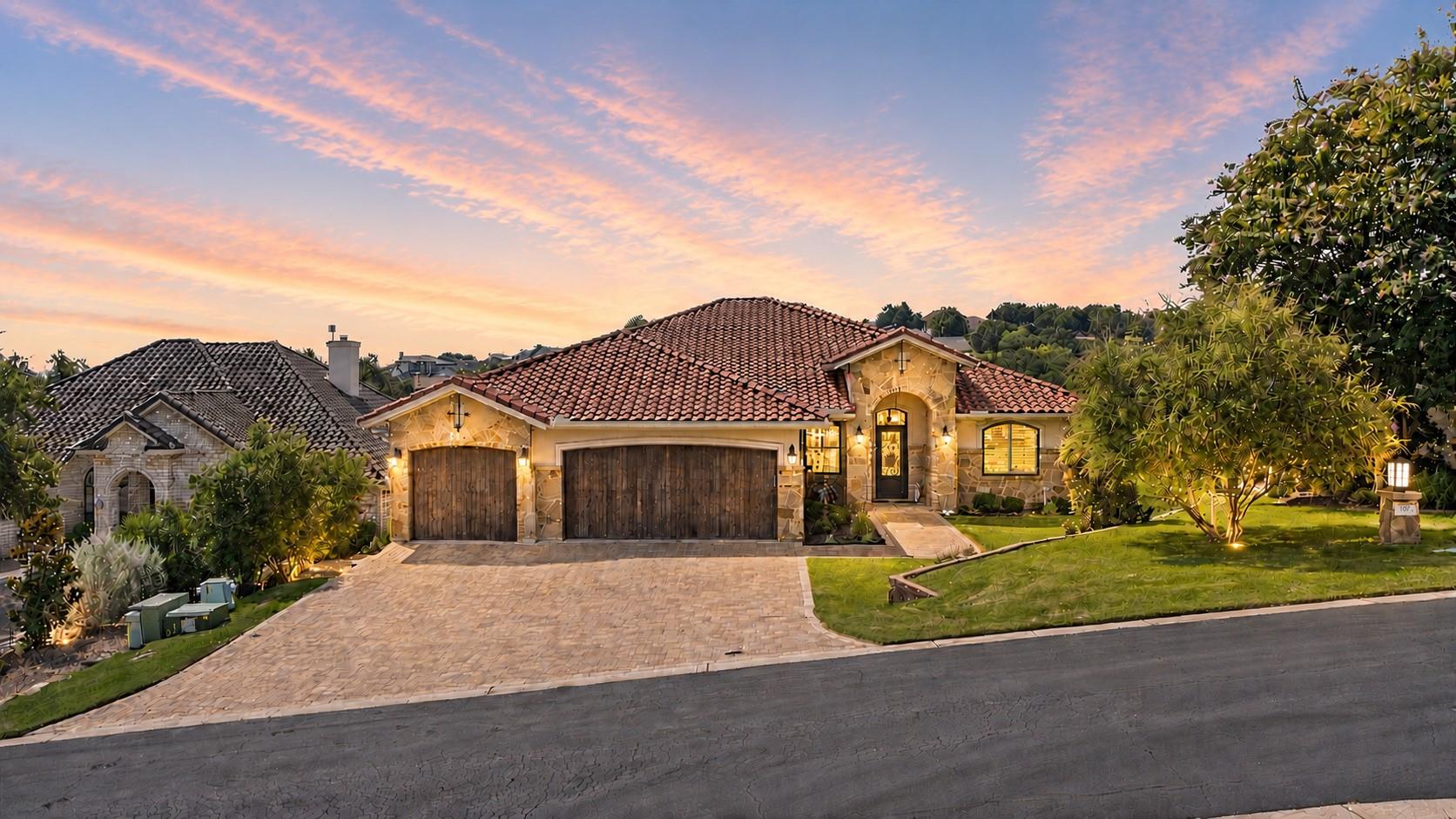 A terracotta-tiled roof crowns this handsome ston