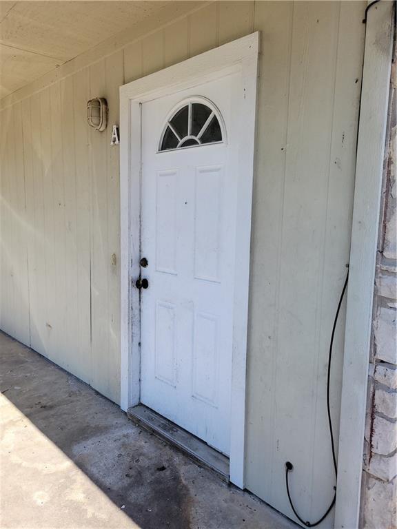 An inviting entrance with a classic paneled door 