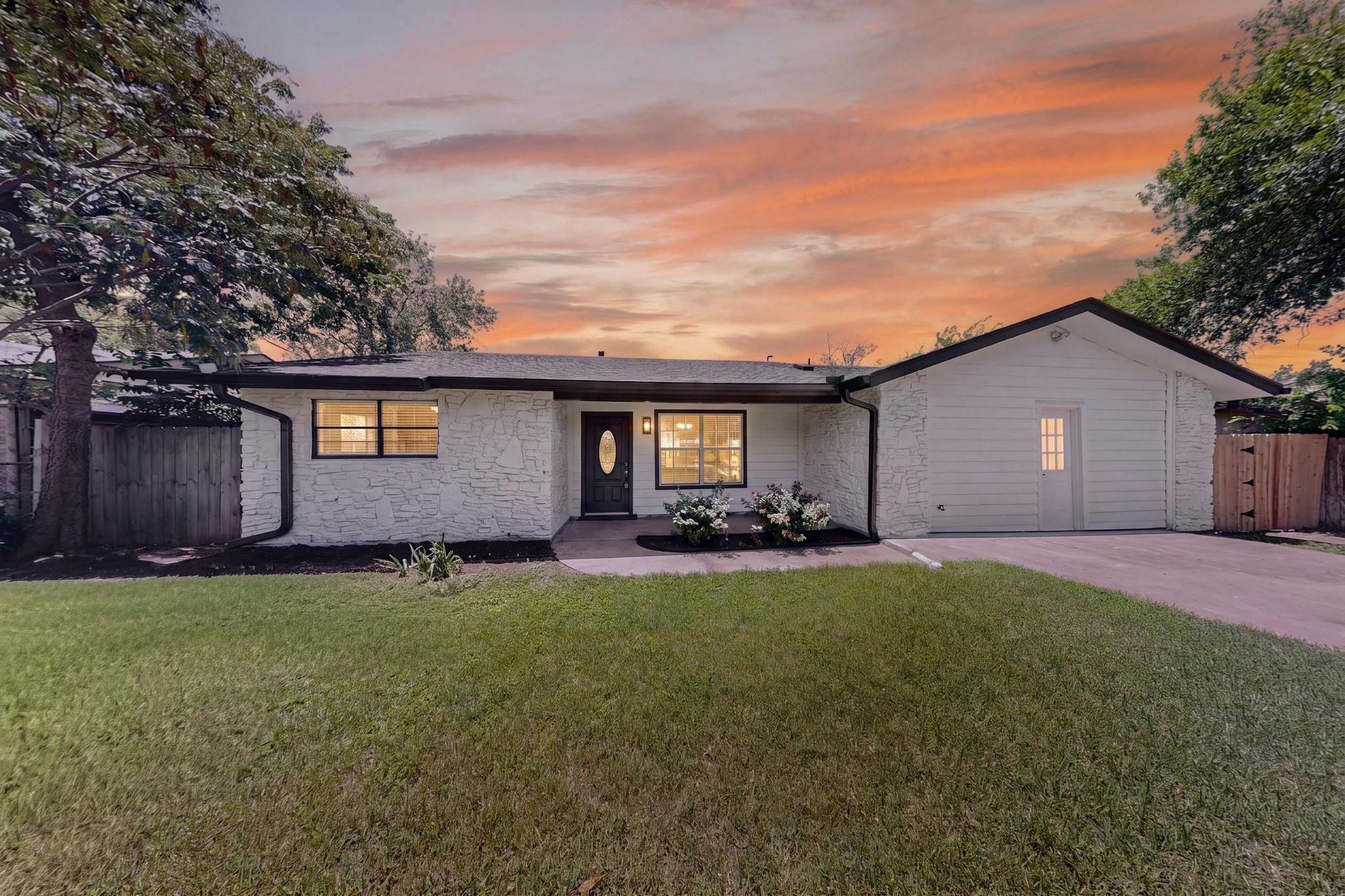 A welcoming facade presents a pleasing blend of w