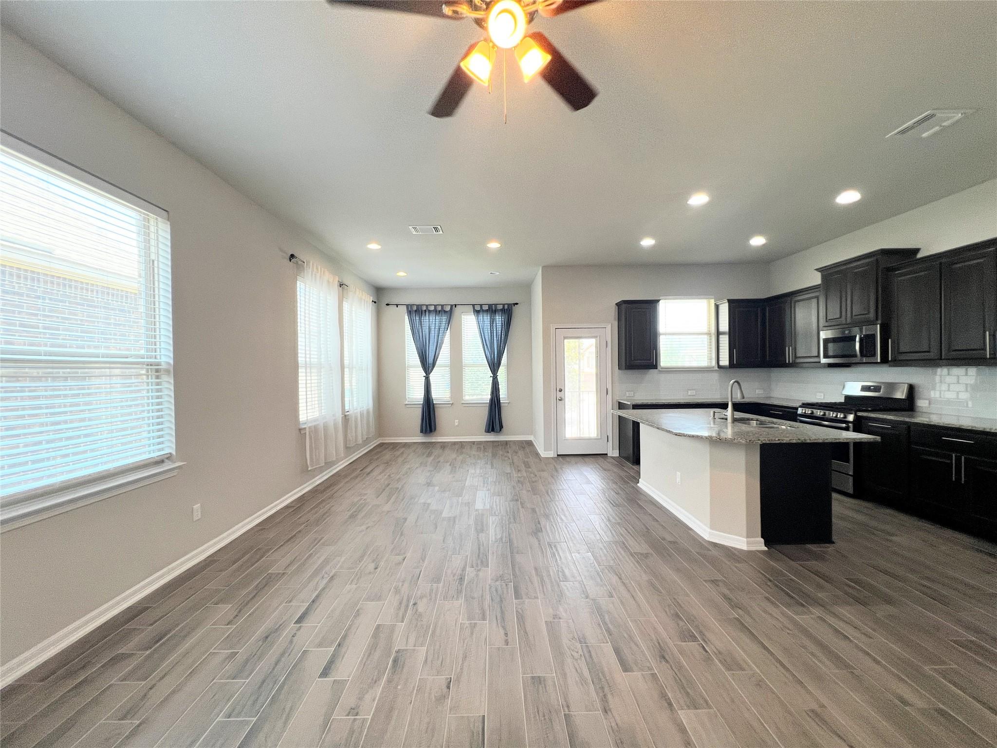 An open concept living area transitions seamlessl