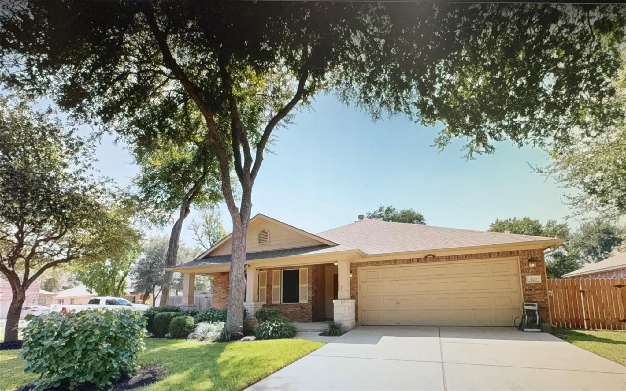 A well-maintained single-story residence with a t
