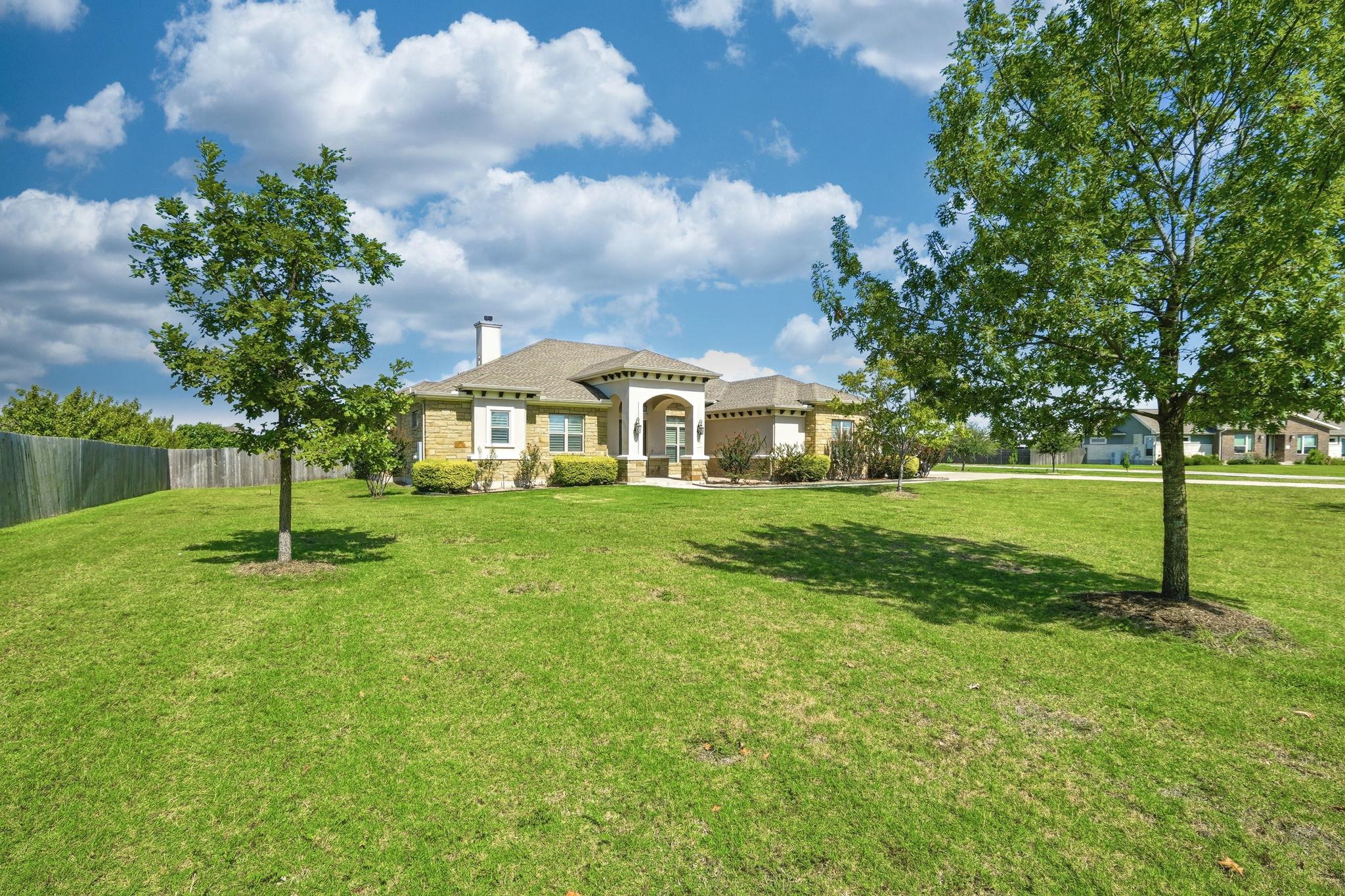 A graceful home with a stone and stucco facade, c