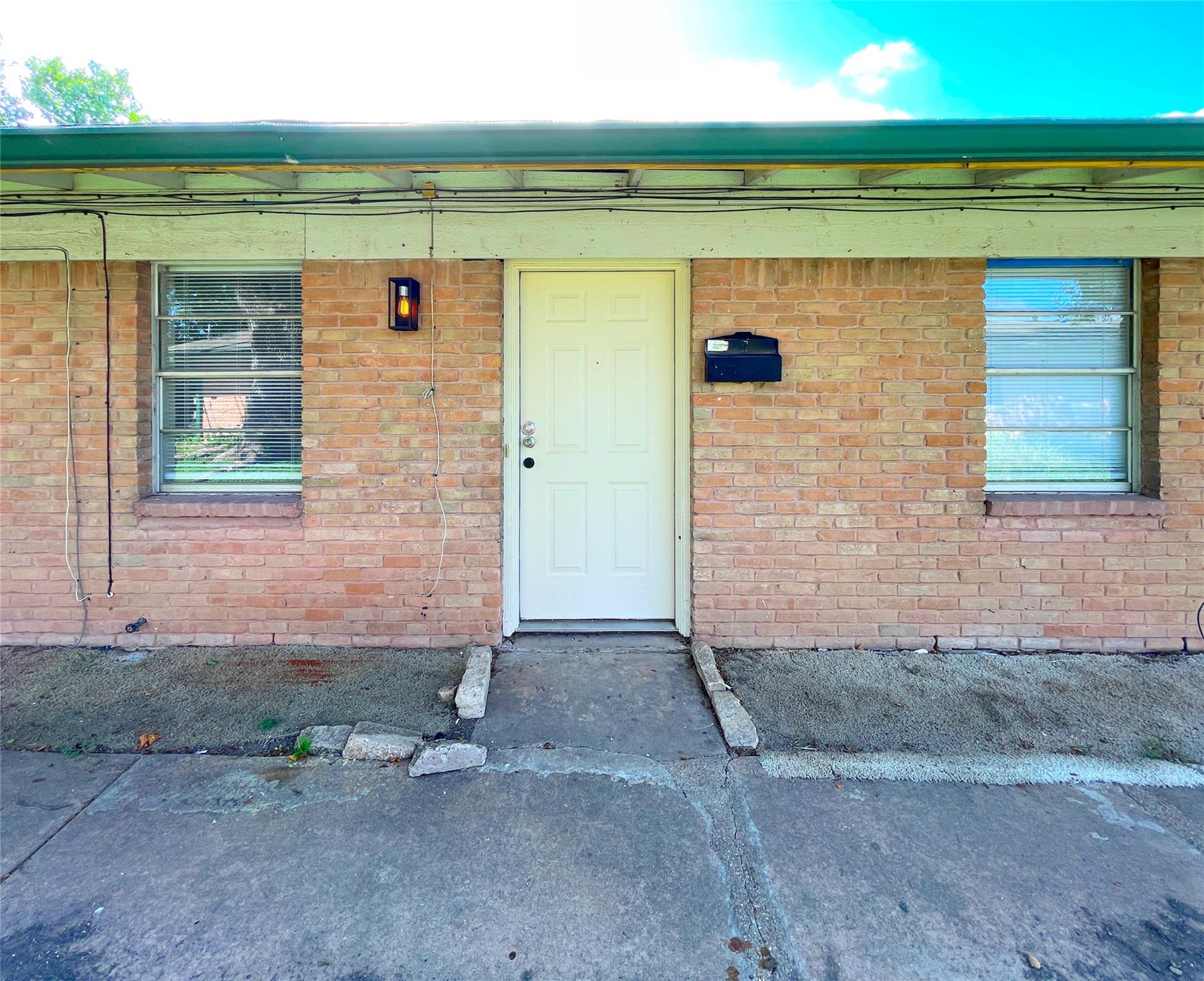 A classic brick exterior presents a straightforwa