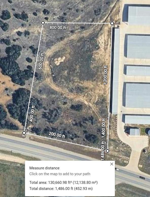 A spacious, undeveloped parcel of land awaits its