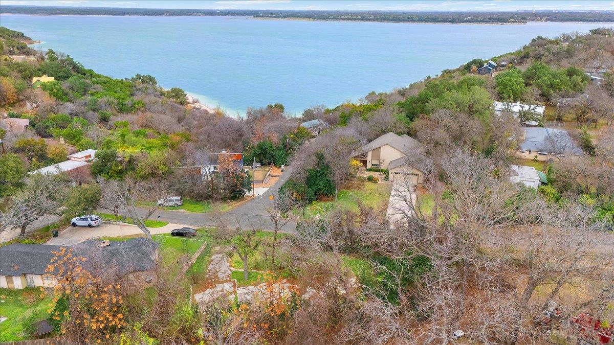 Perched above a serene lake, this property offers